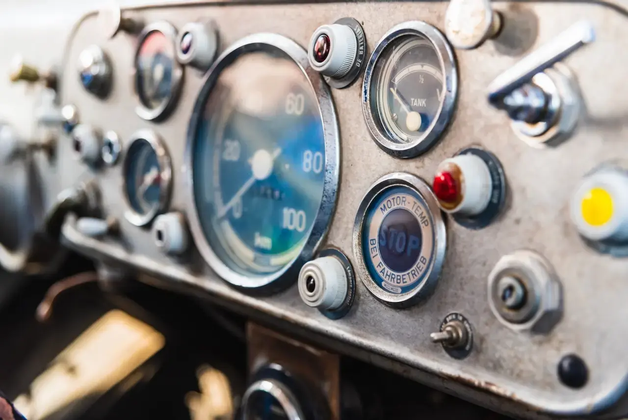 An angled view of a classic car dashboard 