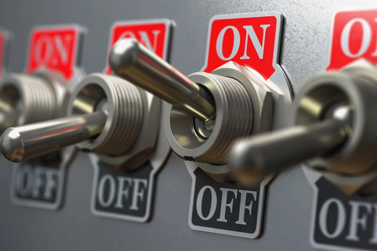 A row of switches with "on" above each switch and "off" below each switch. Some switches are in the "on"position and others are "off"