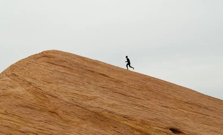 Person running uphill